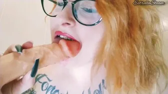 Redhead Sucks Dildo